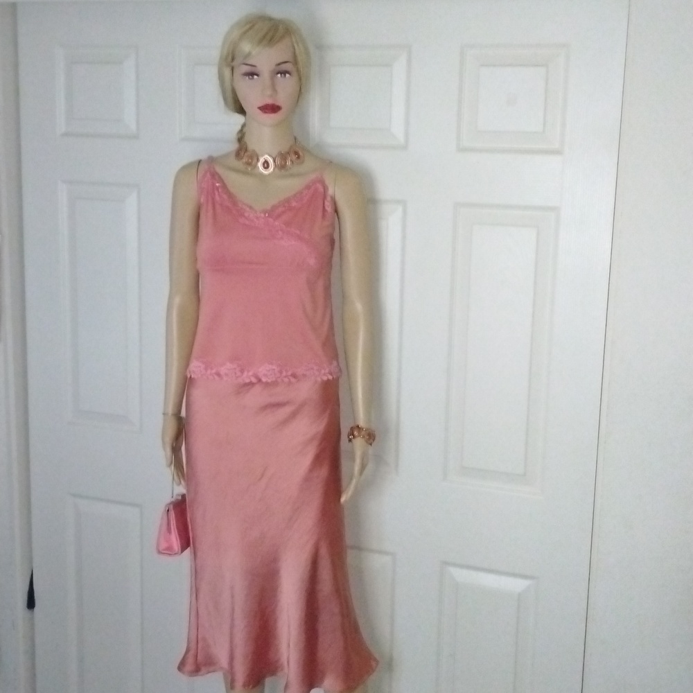 Two-piece Cami and skirt set with matching purse.